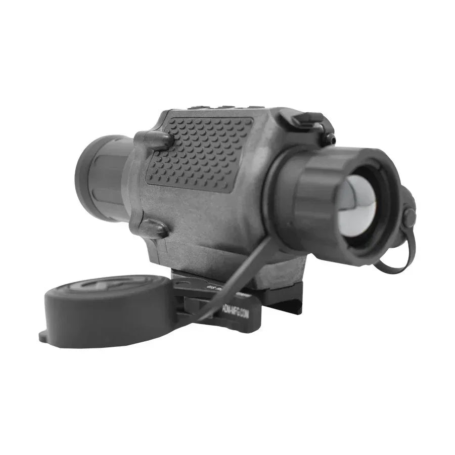 Handheld thermal monocular with textured grip, lens cap, and focus adjustment knob