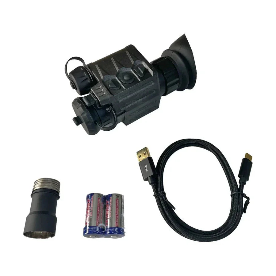 Digital night vision monocular with USB cable, batteries, and lens adapter on white background