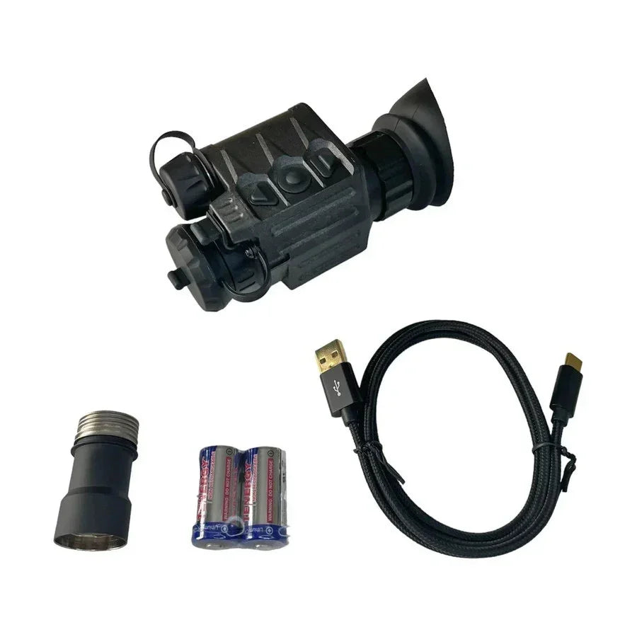 Digital night vision monocular with USB cable, batteries, and lens adapter on white background
