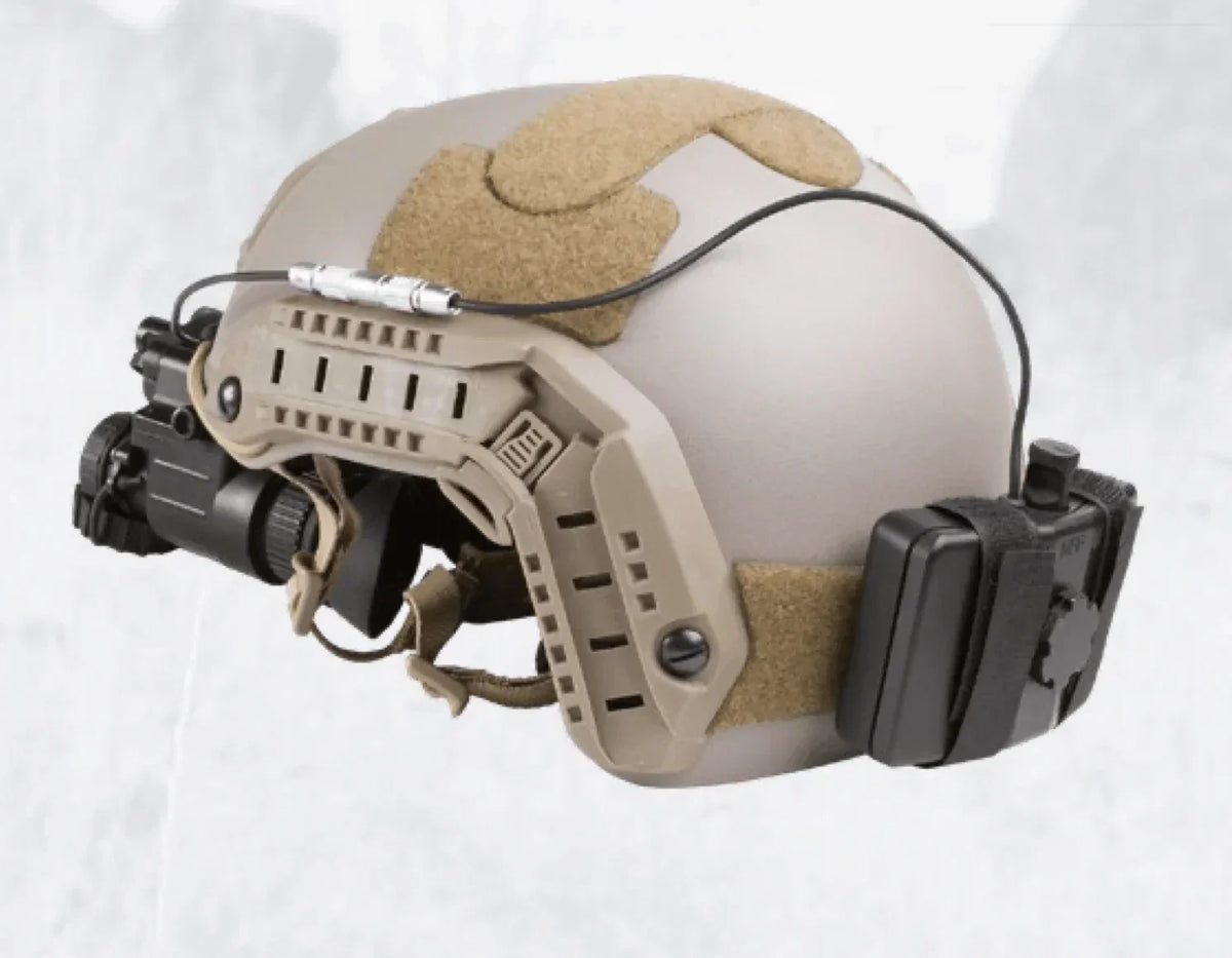 Tactical helmet with night vision mount and external battery pack attached