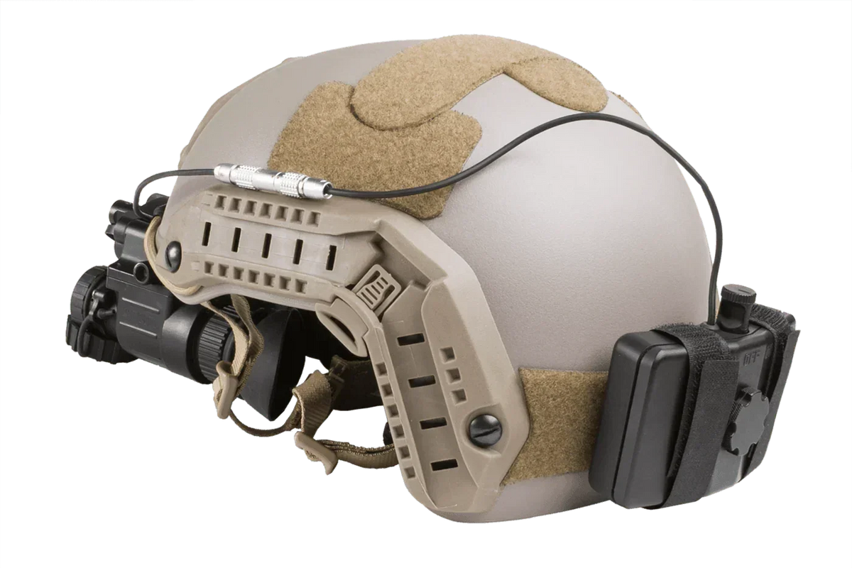 Tactical helmet with mounted night vision binoculars and battery pack side view