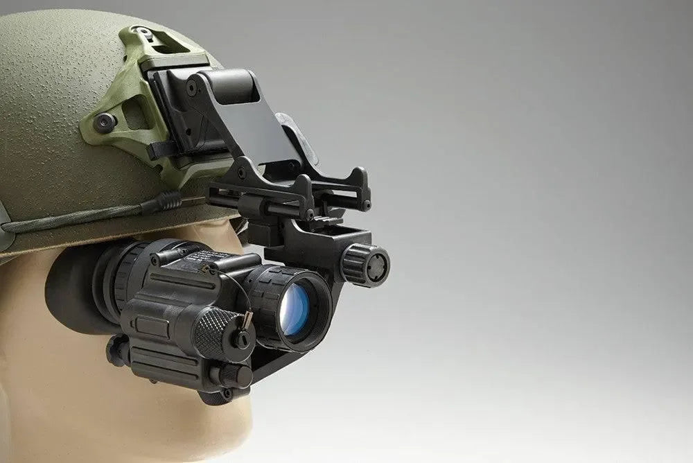 PVS-14 Gen 3 night vision monocular mounted on a tactical helmet