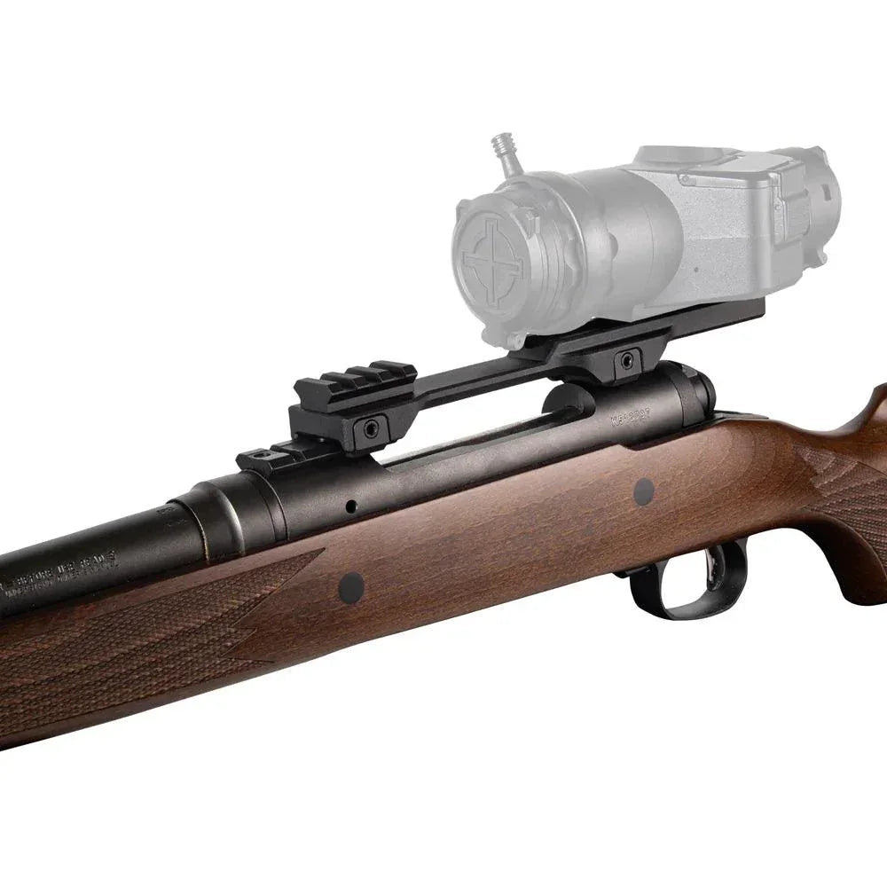 Locking bolt action rifle mount attachment for night vision optic, shown on a wooden rifle