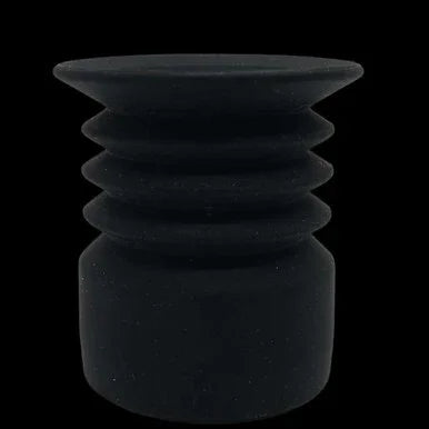 Black rubber eyecup for night vision or thermal optic device against black background