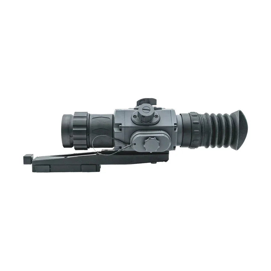 Thermal rifle scope with rubber eyepiece and side adjustment knob, isolated on white background