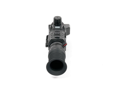 Compact night vision scope with tactical controls and ergonomic design for low-light use
