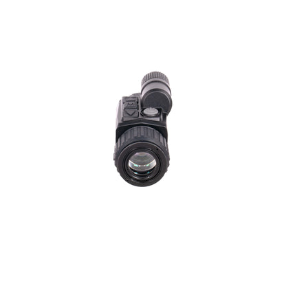 Black night vision optic device viewed from the front on a white background