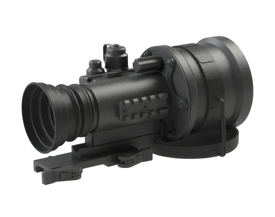 Compact night vision optic device with mounting rail and adjustment knobs on white background