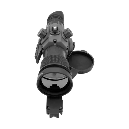 Digital night vision scope with lens cap open, control knobs, and mounting rail