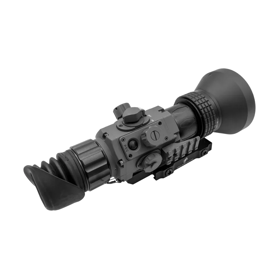 Tactical night vision riflescope with control dials and rubber eyecup on white background