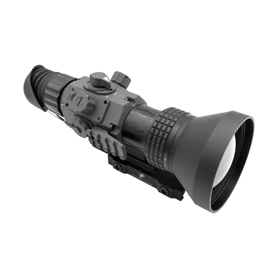 Compact night vision rifle scope with large lens and adjustment dials on white background