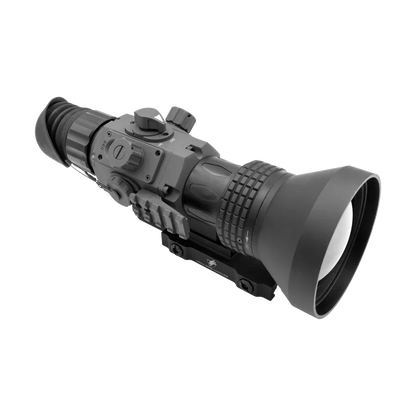 Compact night vision rifle scope with large lens and adjustment dials on white background