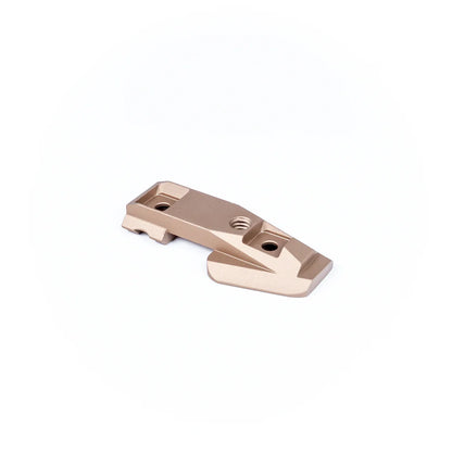 tan anodized metal optic mount with two screw holes, angled design, isolated on white