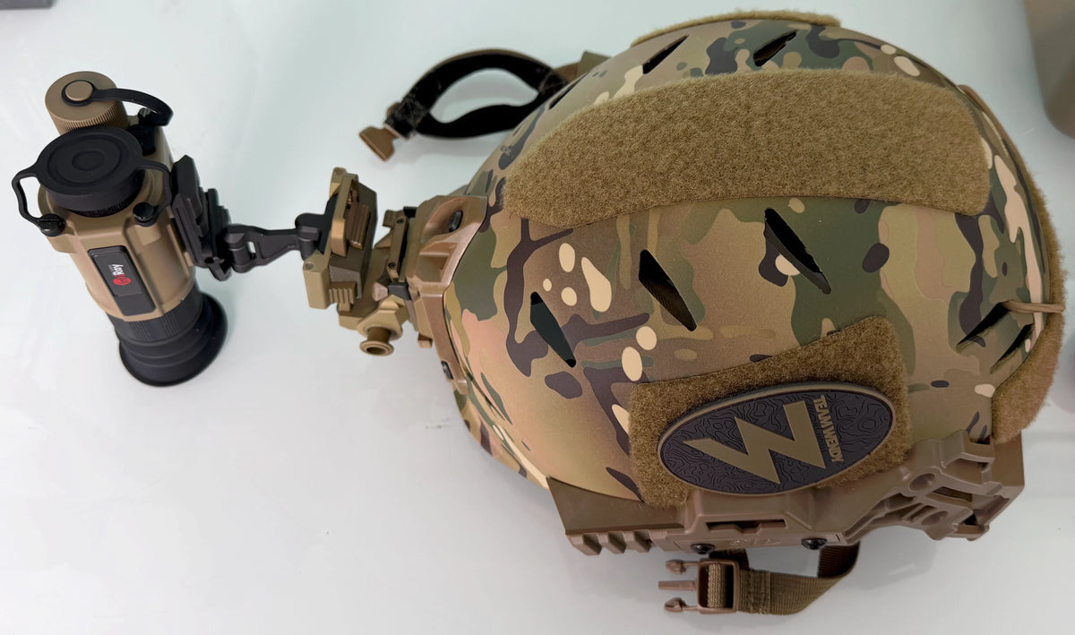 InfiRay thermal monocular mounted on a camouflage tactical helmet