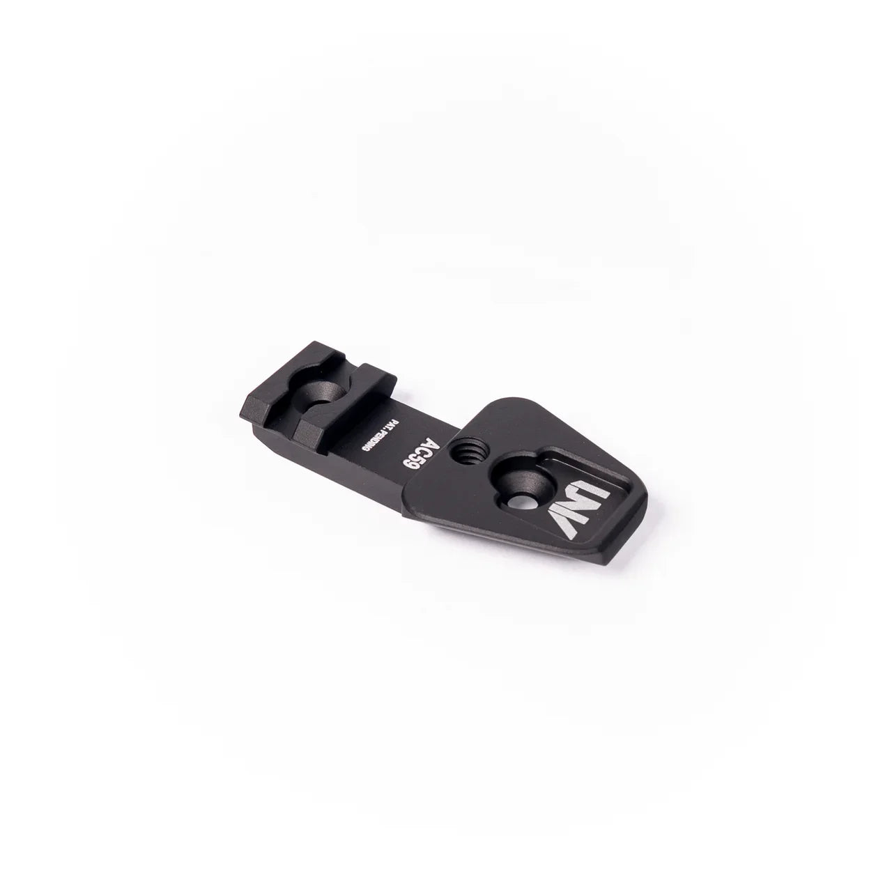 Black metal night vision optics accessory mounting plate on white background