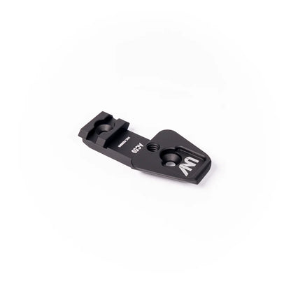 Black metal night vision optics accessory mounting plate on white background