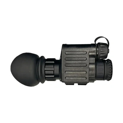 Compact black night vision monocular with textured body and rubber eyecup on white background
