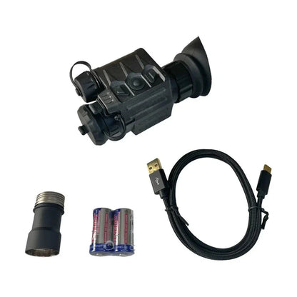 Digital night vision monocular with USB cable, batteries, and lens adapter on white background