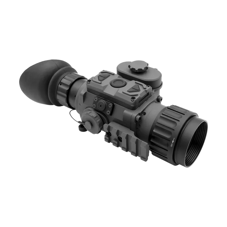 Tactical night vision scope with large eyepiece and adjustment knobs, isolated on white