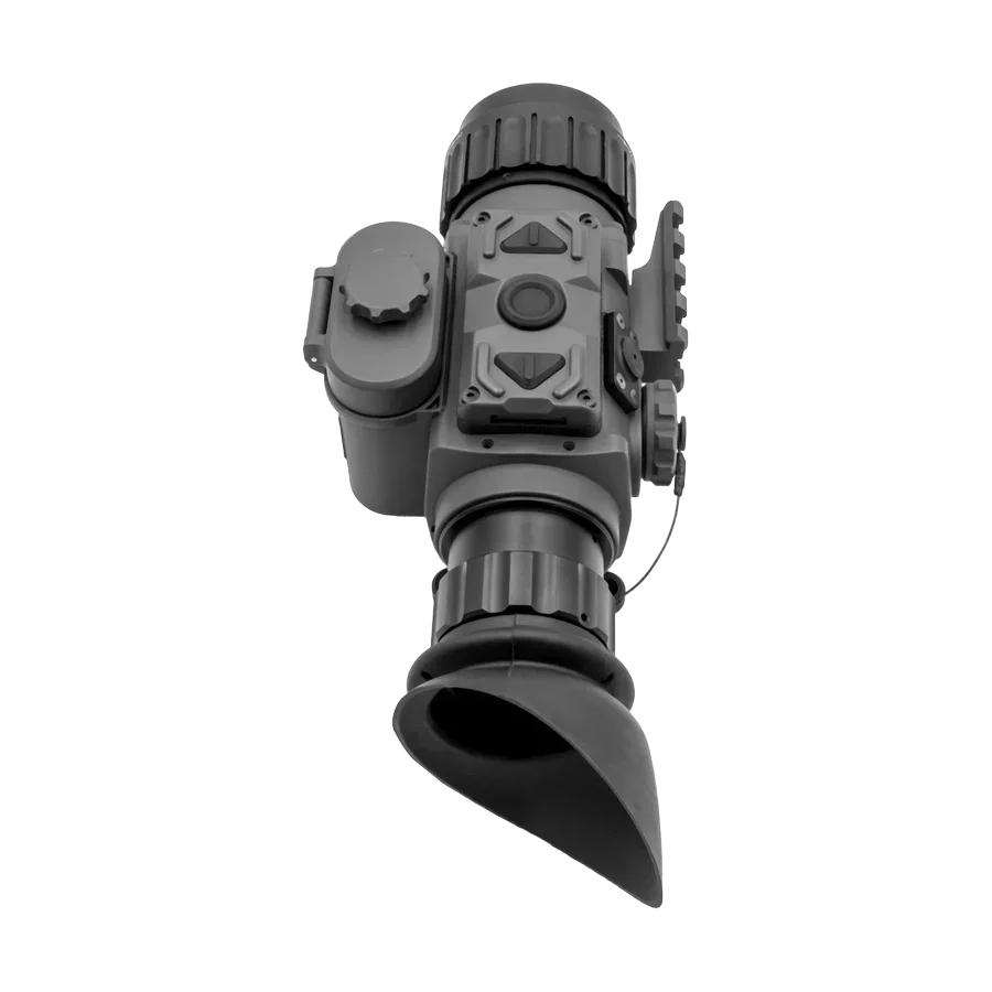 Digital night vision scope with rubber eyepiece, control buttons, and mounting rail