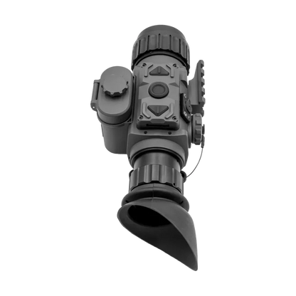 Digital night vision scope with rubber eyepiece, control buttons, and mounting rail