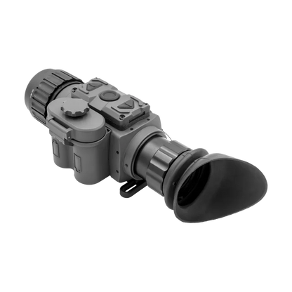 Compact thermal scope with rubber eyecup and control buttons on a white background