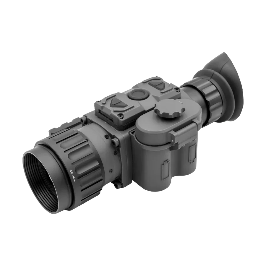 Digital night vision scope with large objective lens and rubber eyepiece on white background