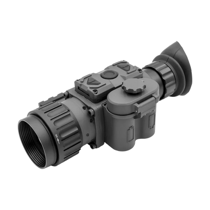 Digital night vision scope with large objective lens and rubber eyepiece on white background