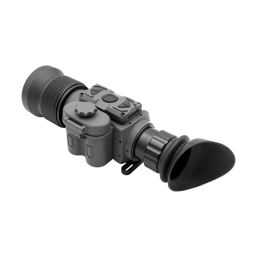 Compact thermal night vision monocular with textured lens and rubber eyepiece on white background