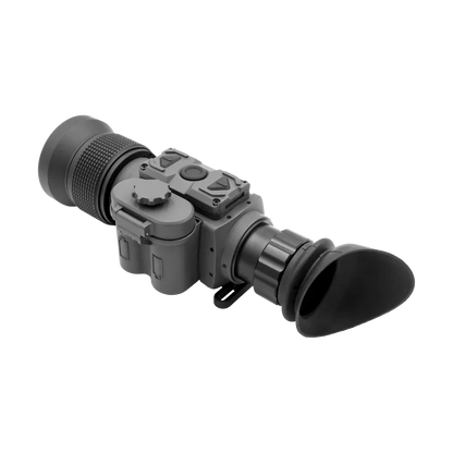 Compact thermal night vision monocular with textured lens and rubber eyepiece on white background