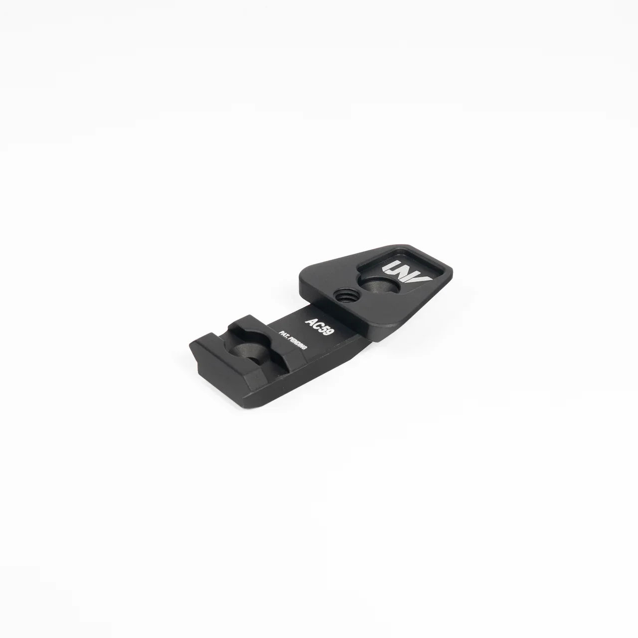 Black metal optic mount accessory marked AC39 and UNV, isolated on white background